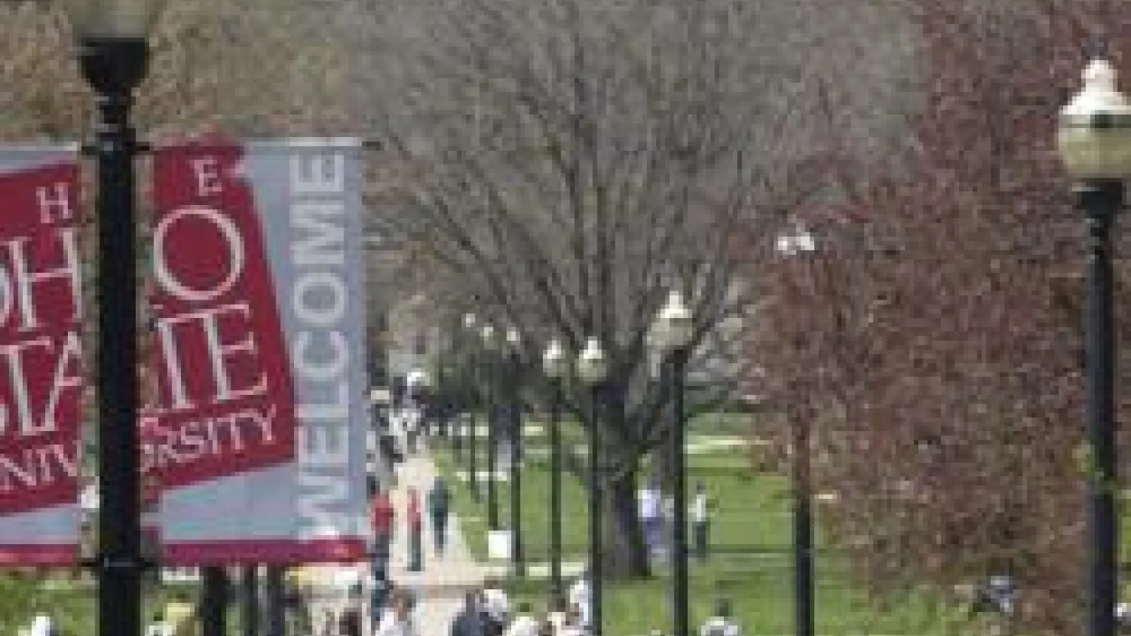 Students walking on the oval.