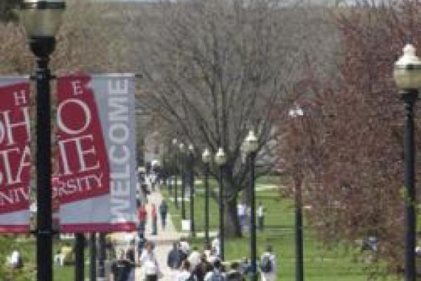 Students walking on the oval.